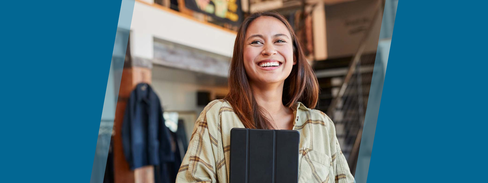 Business owner smiling in her shop