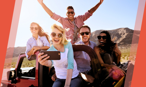 Group of friends smiling for a selfie